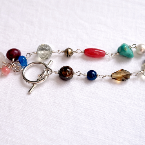 Eclectic Gemstone Charm Bracelet with Buddha Pendant